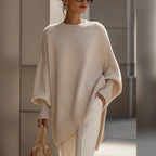 women's oversized asymmetrical hem sweater in beige