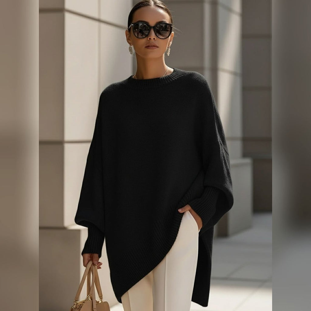women's oversized asymmetrical hem sweater in black