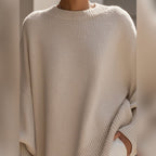 women's oversized asymmetrical hem sweater in beige