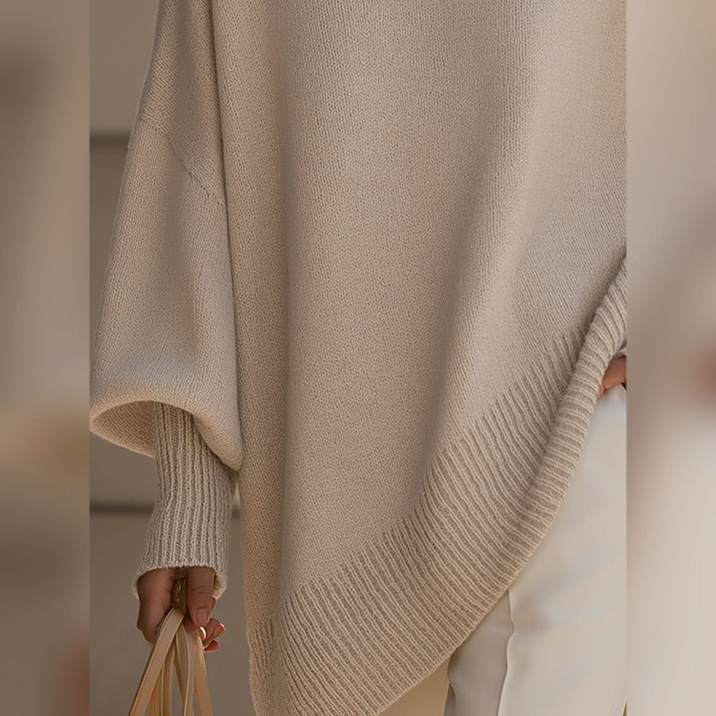 women's oversized asymmetrical hem sweater in beige