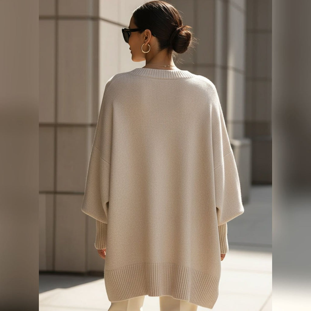 women's oversized asymmetrical hem sweater in beige