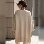 women's oversized asymmetrical hem sweater in beige