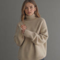women's oversized turtleneck sweater beige