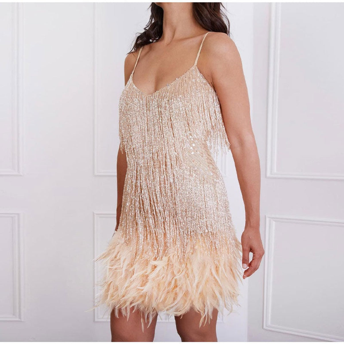 women's sequin cocktail dress with feather hem in rose gold