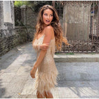 women's sequin cocktail dress with feather hem in rose gold
