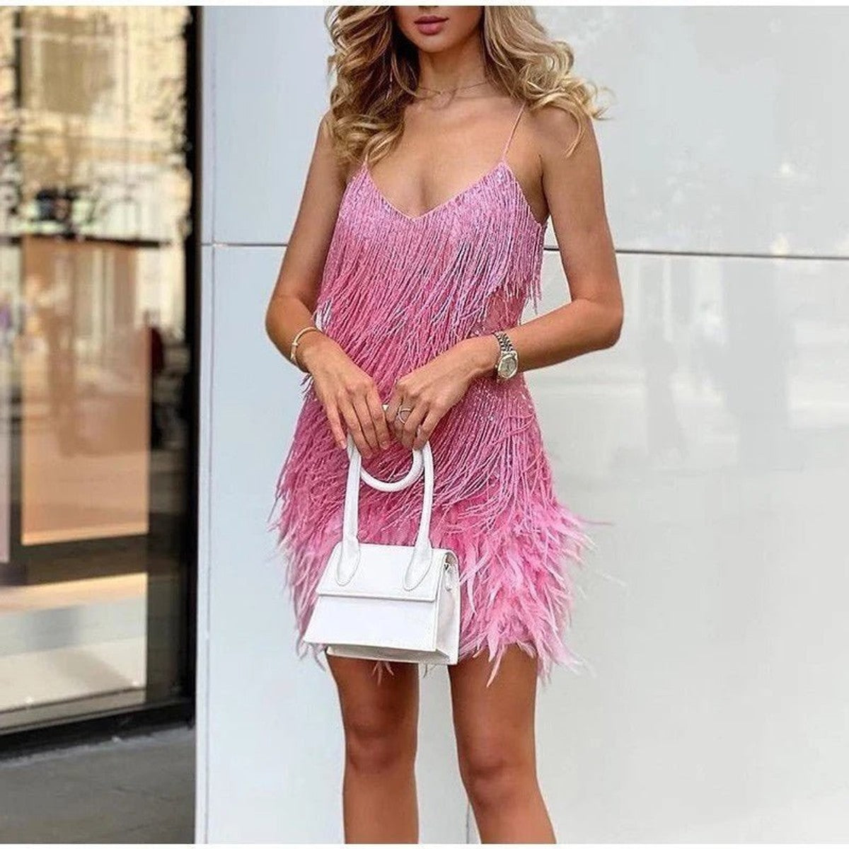 women's sequin cocktail dress with feather hem in pink